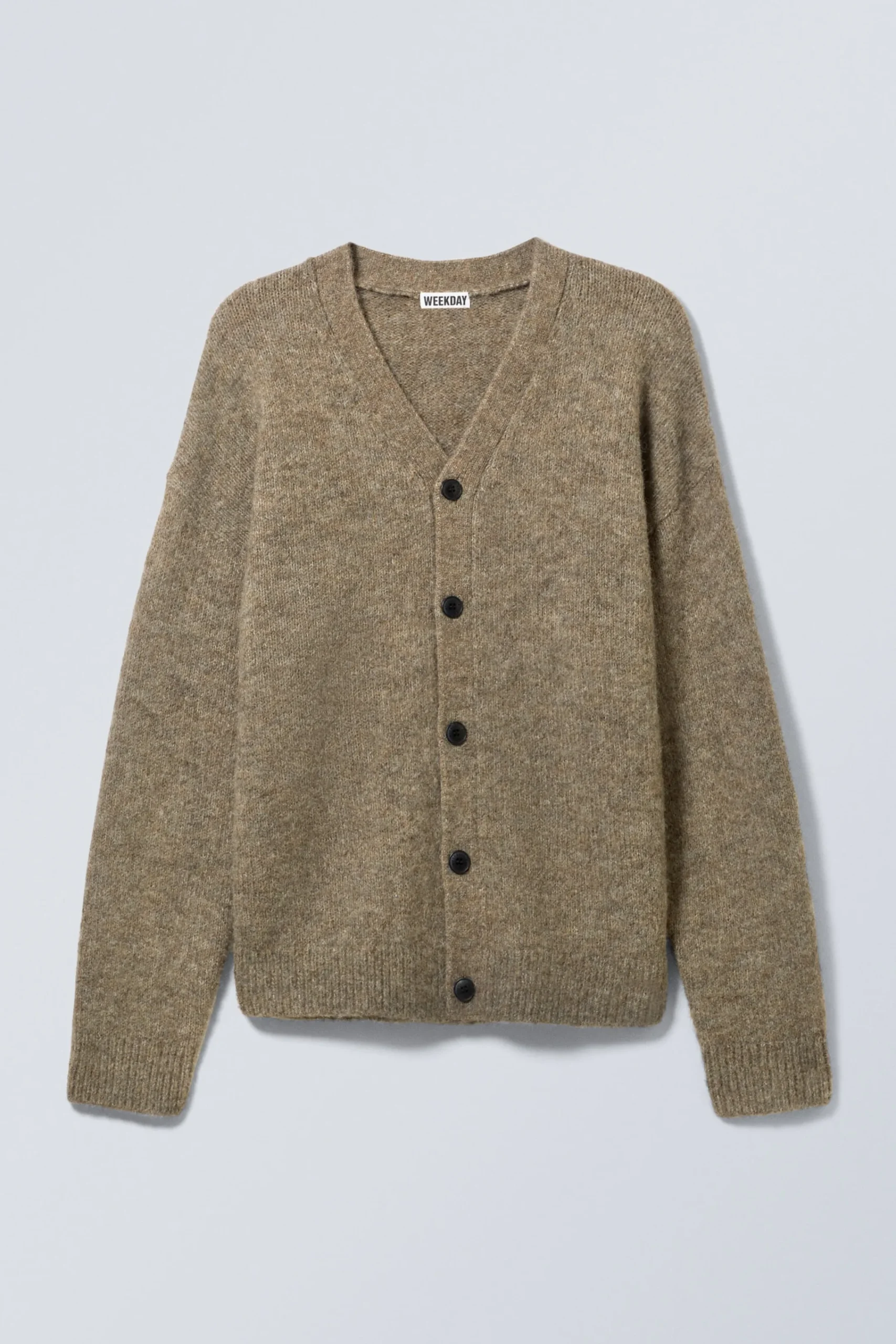 avslappnad_stickad_cardigan_i_ullblandning_2-1.webp Weekday Stickat<AVSLAPPNAD STICKAD CARDIGAN I ULLBLANDNING