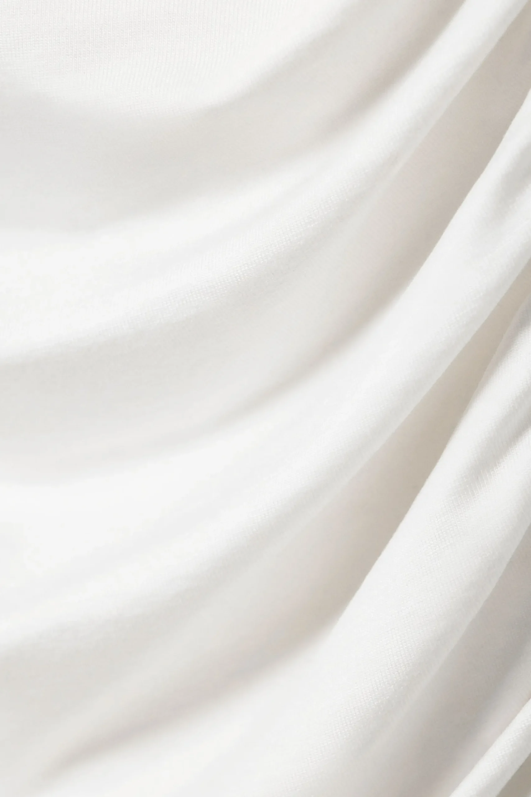 draperad_asymmetrisk_lyocelltopp_3-2.webp Weekday Toppar<DRAPERAD ASYMMETRISK LYOCELL-TOPP