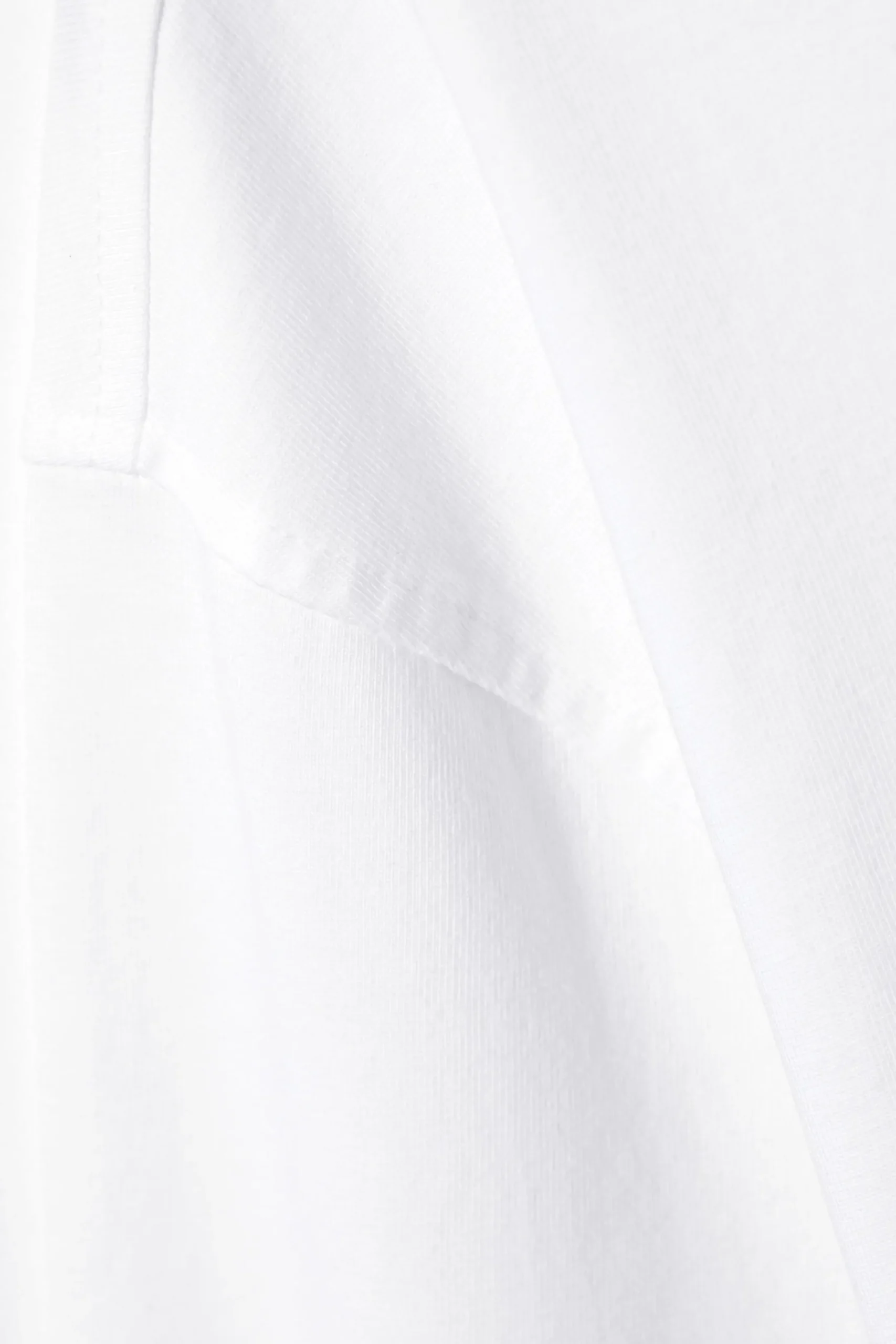 en_oversized_lngrmad_tshirt_4-2.webp Weekday Basplagg<EN OVERSIZED LÅNGÄRMAD T-SHIRT