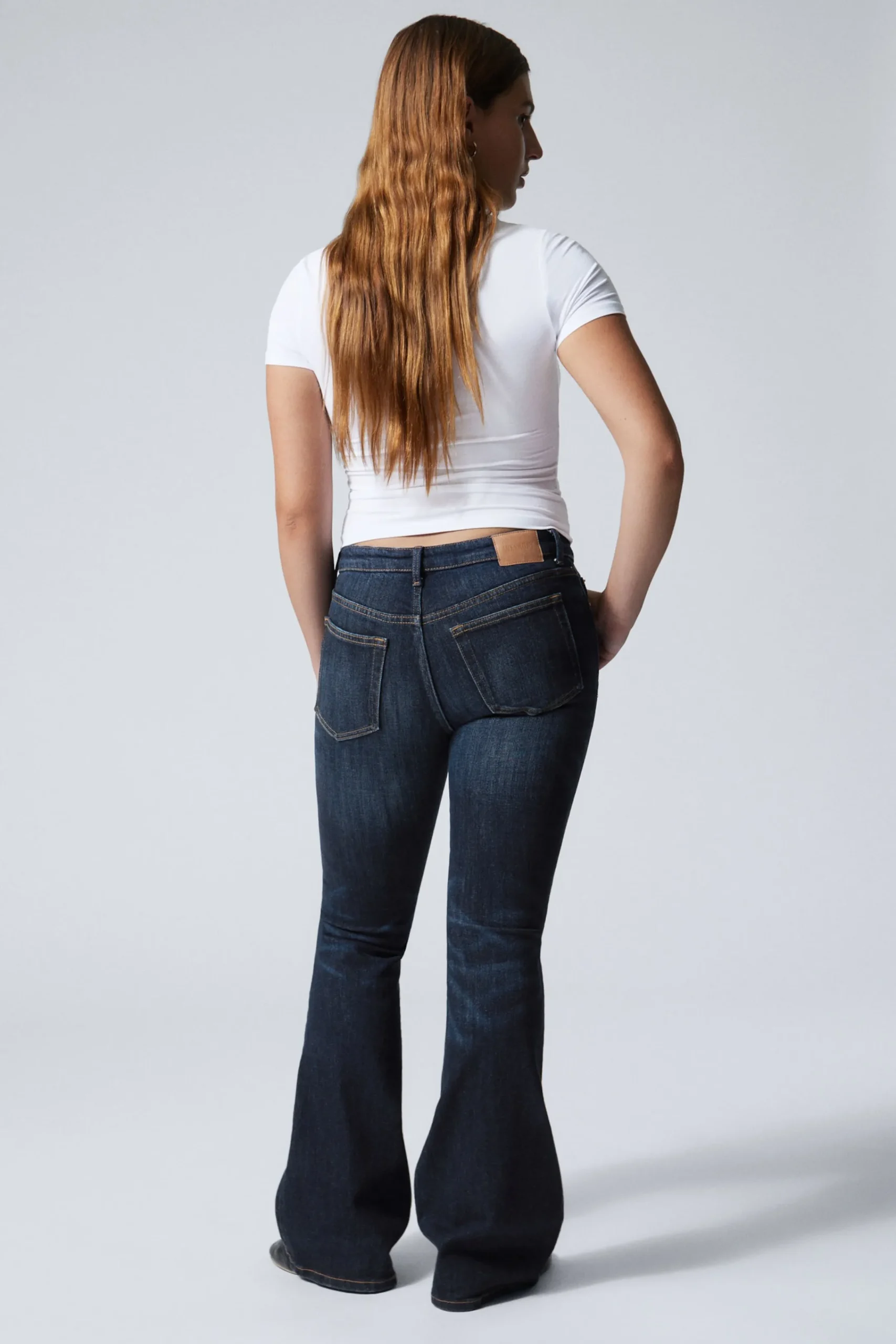 flame_low_waist_slim_flared_leg_jeans_4-3.webp Weekday Jeans<FLAME LOW WAIST SLIM FLARED LEG JEANS