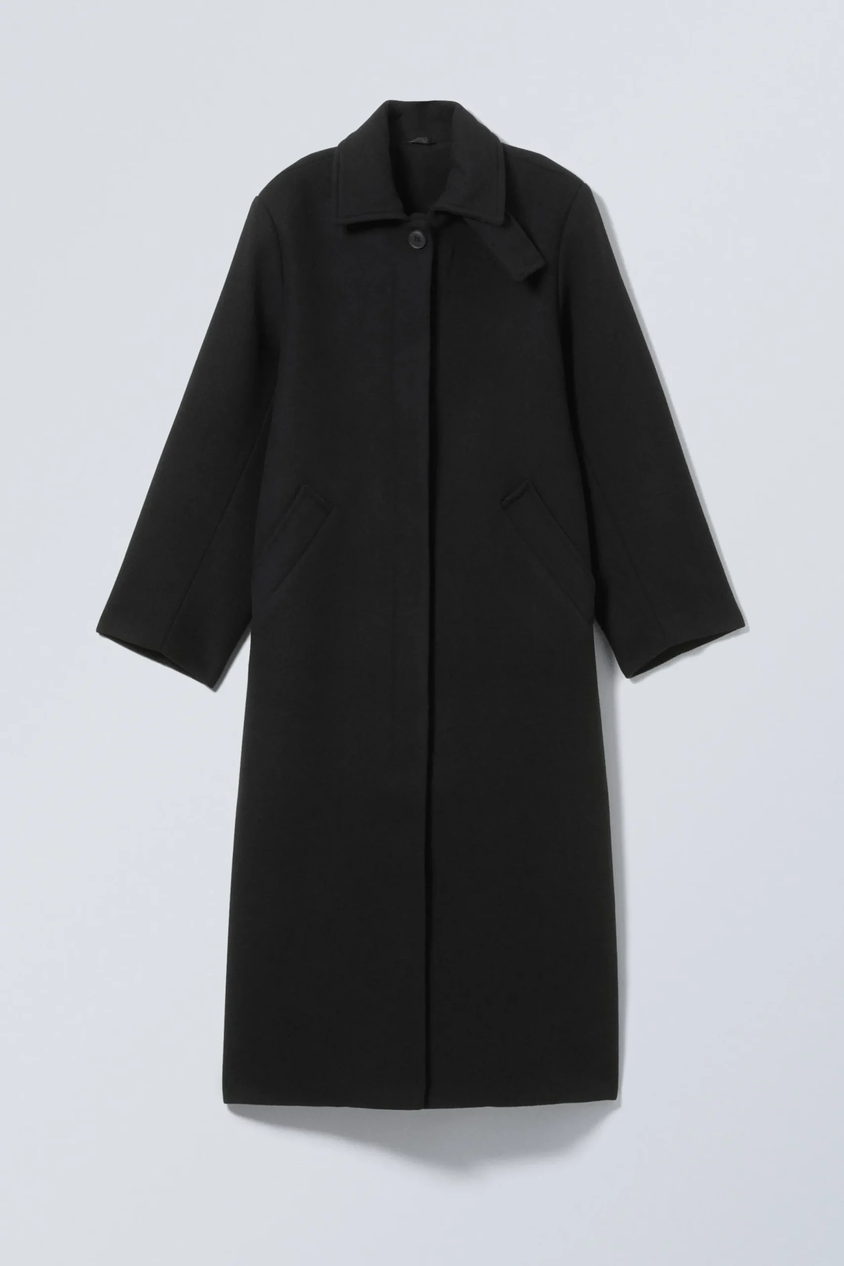lng_oversized_kappa_i_ullblandning_3.webp Weekday Jackor & Kappor<LÅNG OVERSIZED KAPPA I ULLBLANDNING