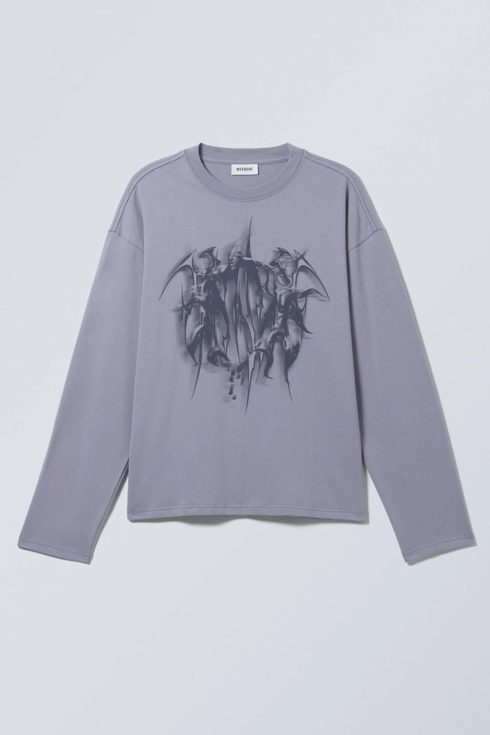 lngrmad_grafisk_tshirt_2-2.webp Weekday Graphics | T-Shirtar & Toppar<LÅNGÄRMAD GRAFISK T-SHIRT