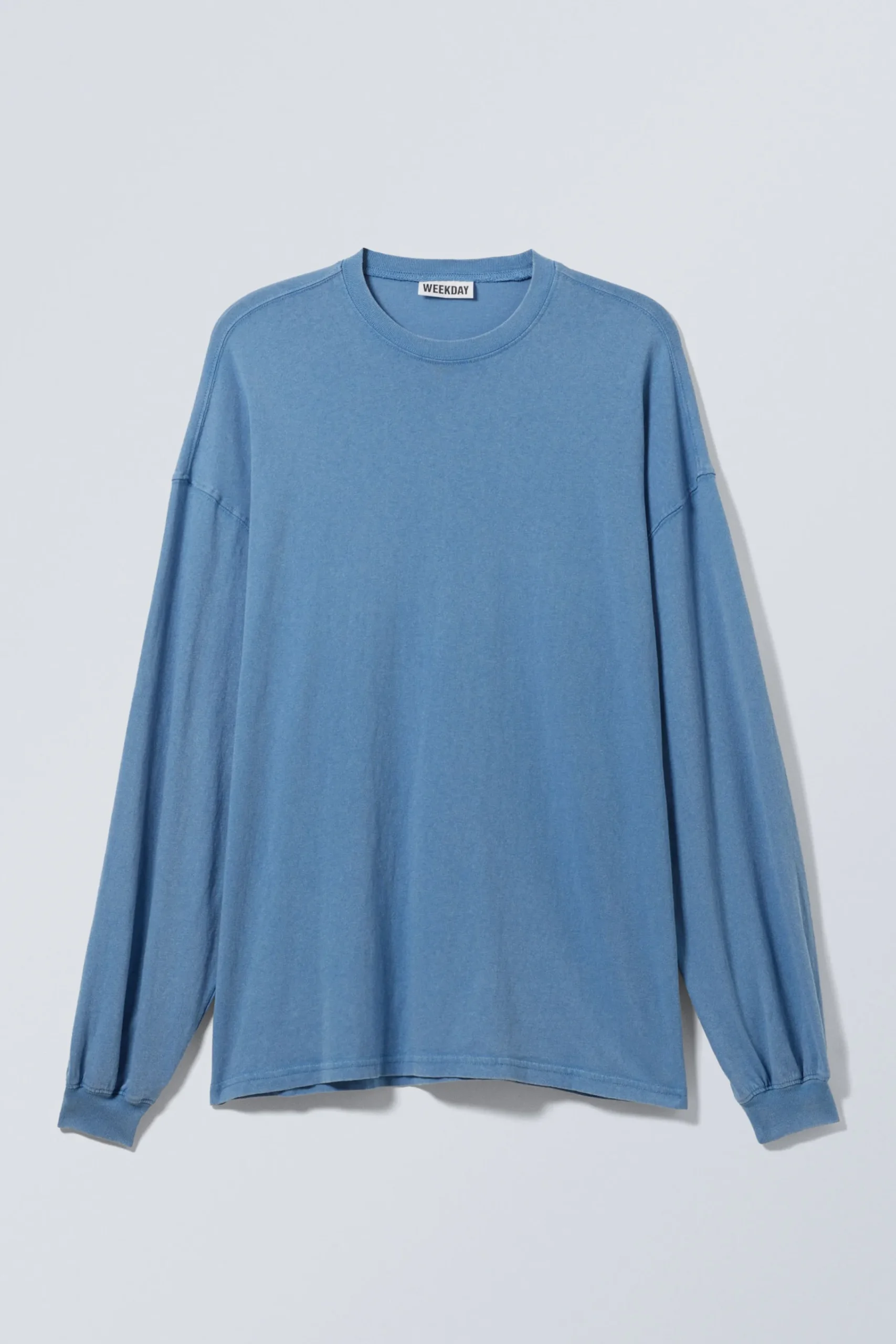 lngrmad_oversized_tshirt_2-1.webp Weekday Basplagg | Toppar<LÅNGÄRMAD OVERSIZED T-SHIRT