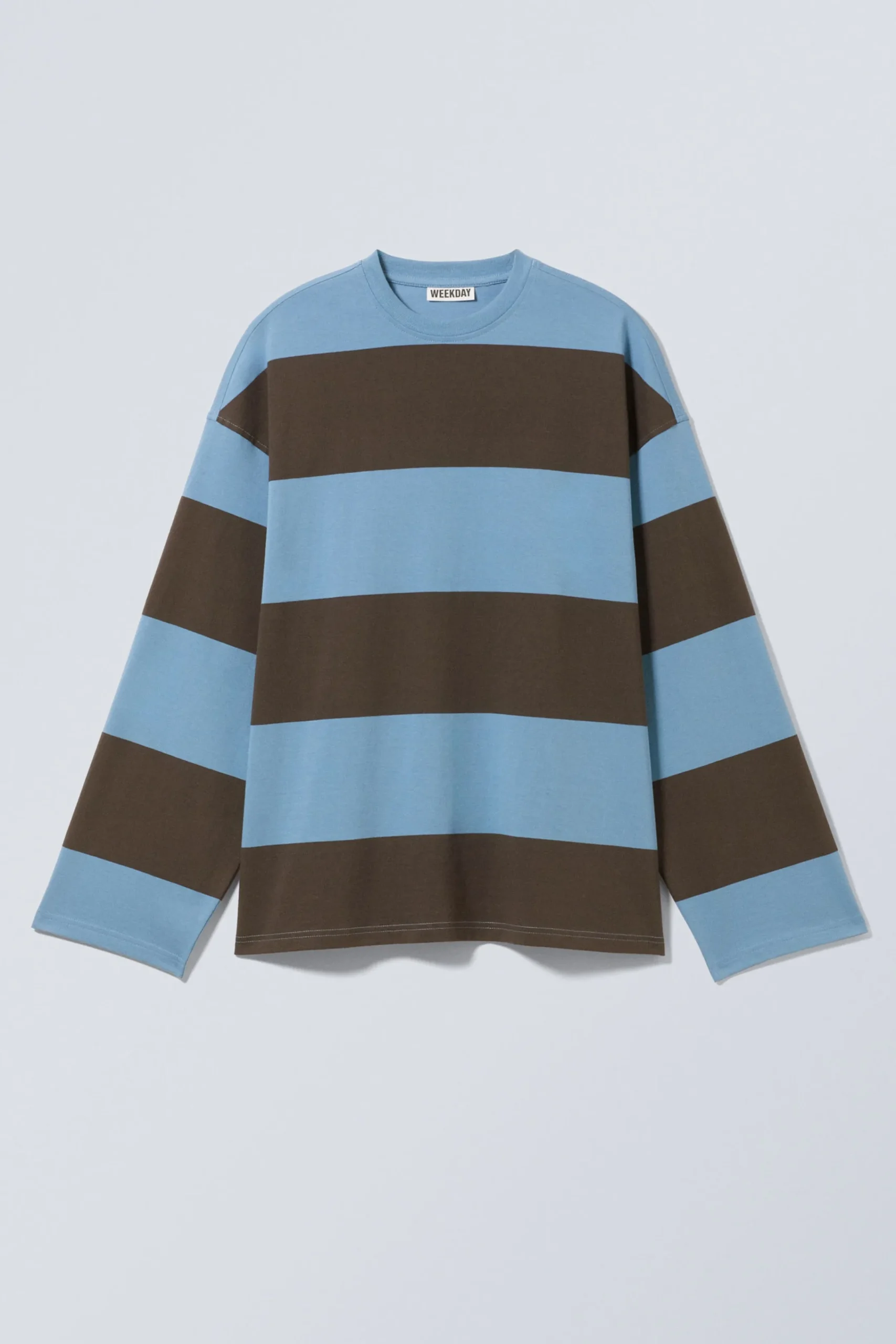lngrmad_oversized_tshirt_i_bomull_2.webp Weekday Toppar<LÅNGÄRMAD OVERSIZED T-SHIRT I BOMULL