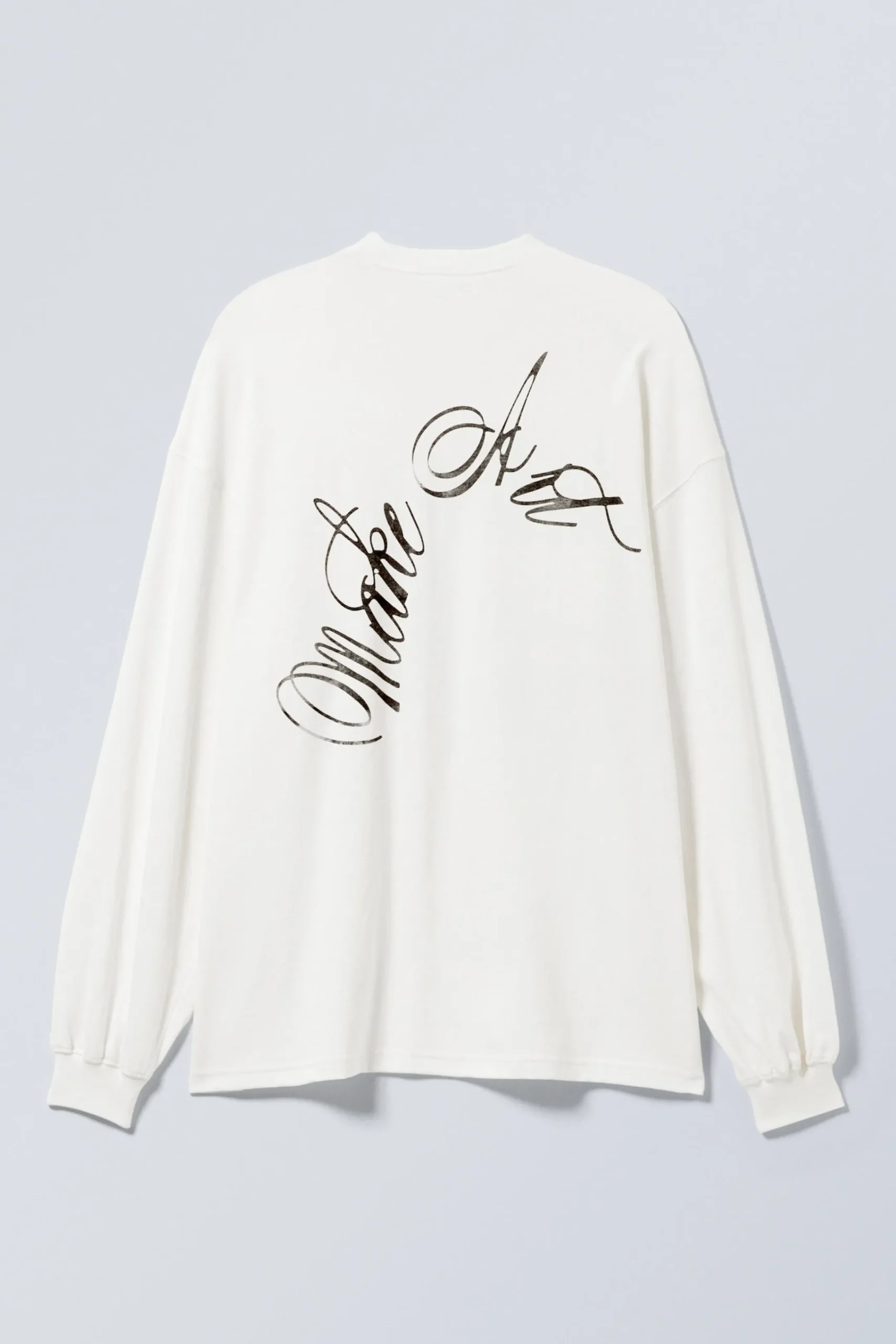 lngrmad_oversized_tshirt_med_tryck_3.webp Weekday Toppar<LÅNGÄRMAD OVERSIZED T-SHIRT MED TRYCK