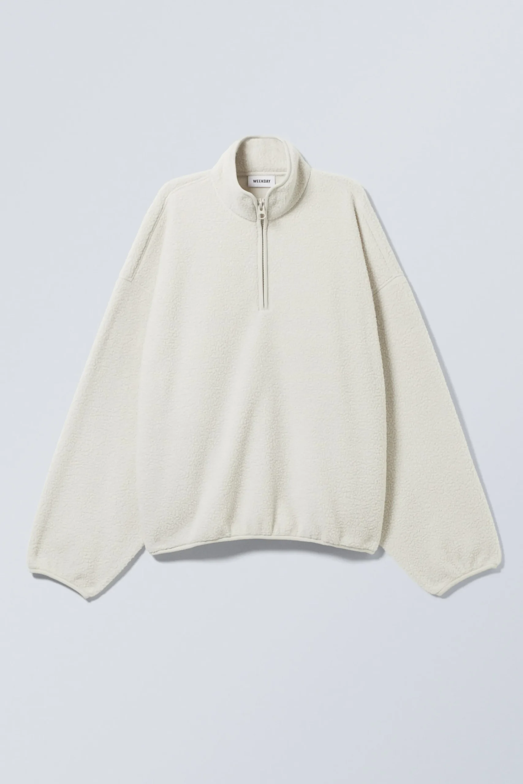 oversized_fleecetrja_med_halv_dragkedja_2-1.webp Weekday Sweatshirts<OVERSIZED FLEECE-TRÖJA MED HALV DRAGKEDJA
