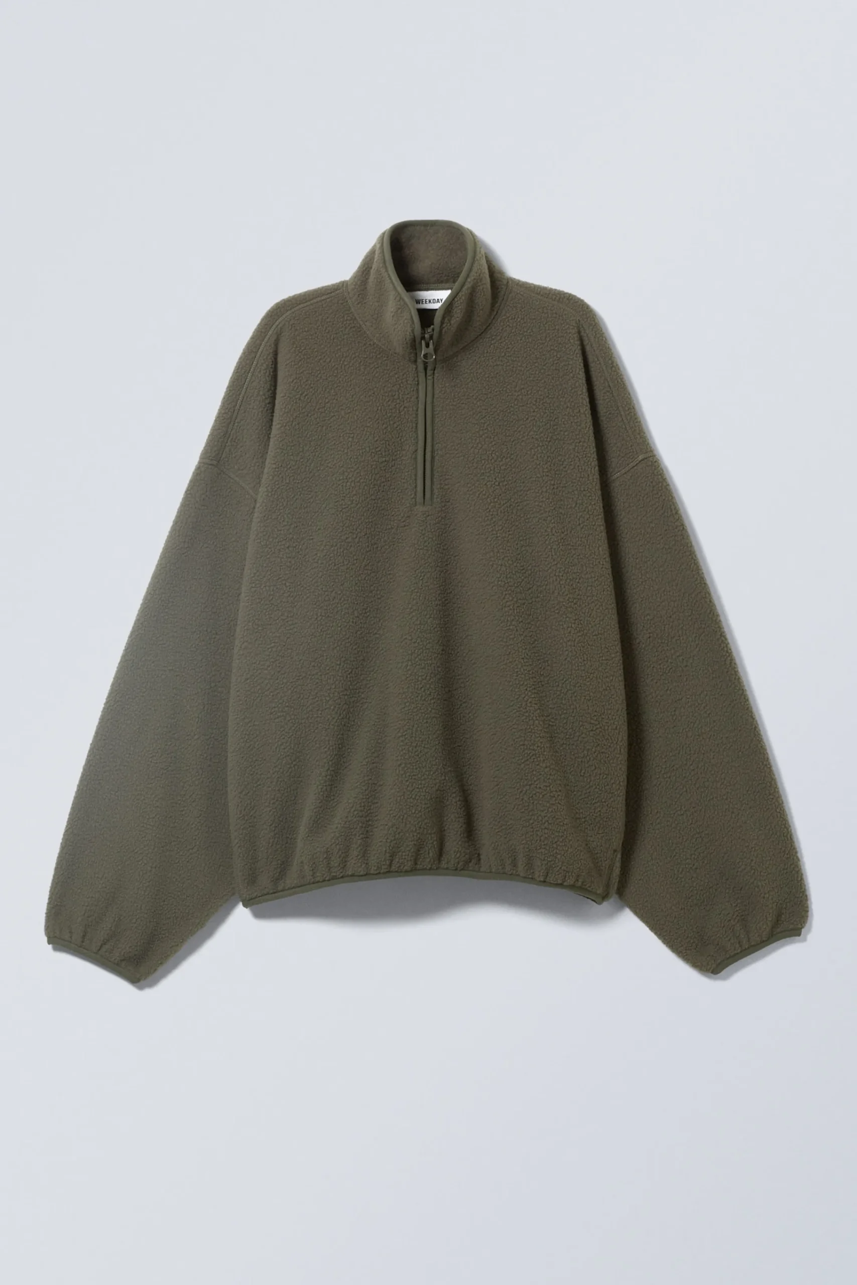 oversized_fleecetrja_med_halv_dragkedja_2.webp Weekday Sweatshirts<OVERSIZED FLEECE-TRÖJA MED HALV DRAGKEDJA