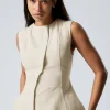 Weekday Toppar<ÄRMLÖS ASYMMETRISK PEPLUM TOPP
