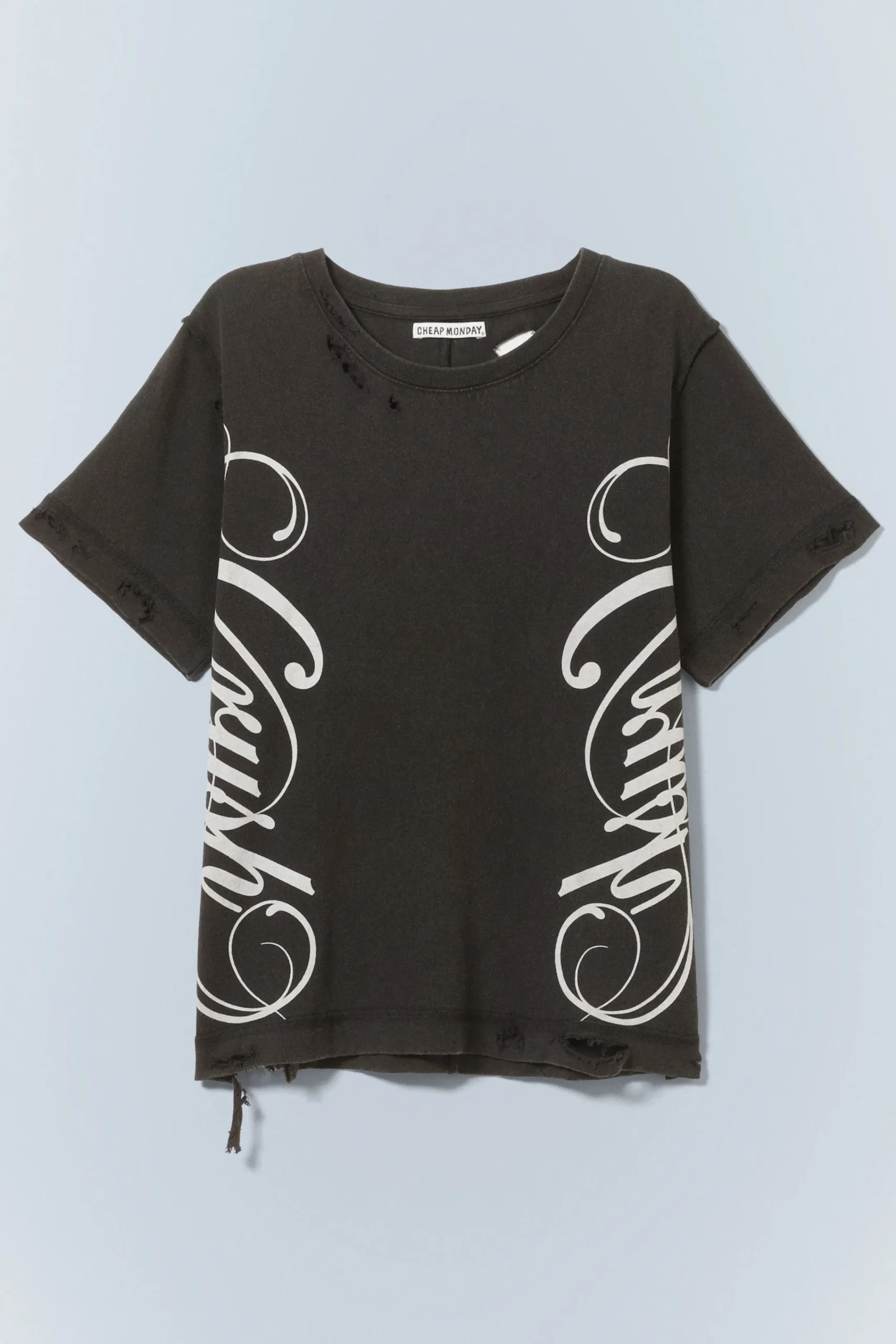 sliten_tshirt_med_tryck_2.webp Weekday Jeans<SLITEN T-SHIRT MED TRYCK