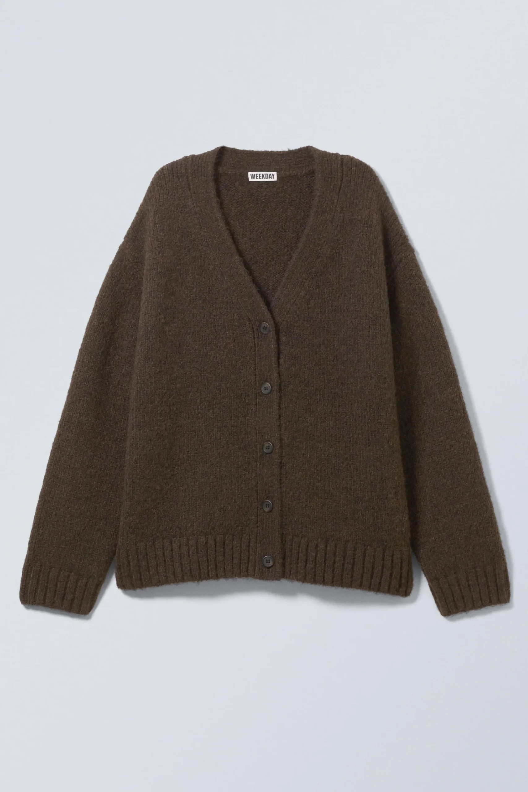 stickad_enkelknppt_cardigan_2-2.webp Weekday Stickat<STICKAD ENKELKNÄPPT CARDIGAN