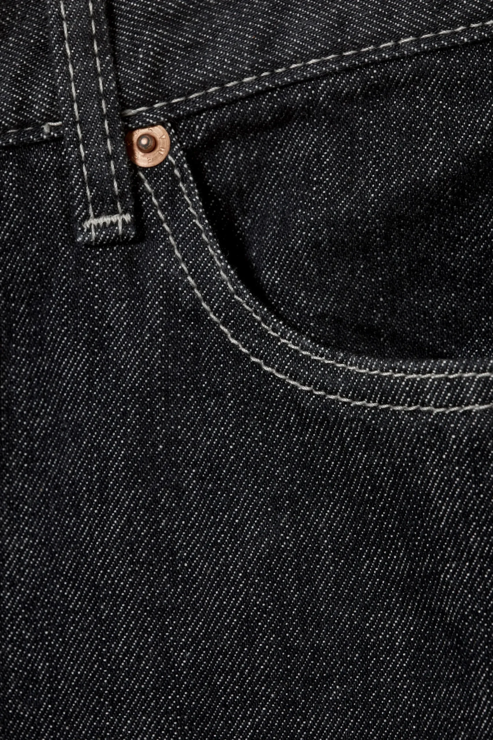 twist_avslappnade_fransiga_jeans_9.webp Weekday Jeans<TWIST AVSLAPPNADE FRANSIGA JEANS